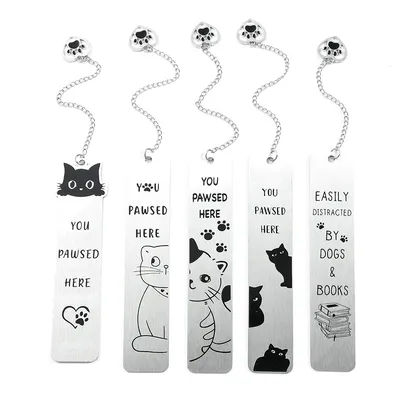 A theme bookmark with paw charm - "You Pawsed Here" quote and cute cat design, suitable for cat enthusiasts, book lovers.
