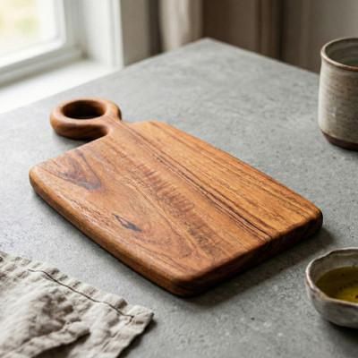 'Hand-Carved Wood Board for Cooking and Serving Snacks'