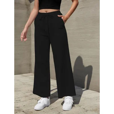 Pantalon décontracté ample à jambe large de couleur unie pour femme avec cordon de serrage et poches, taille haute