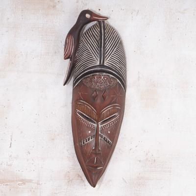 'Folk Art-Inspired Sese Wood African Mask with Bird Motif'