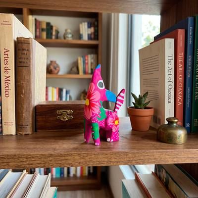 'Animal-Themed Copal Wood Alebrije Coyote Figurine in Fuchsia'