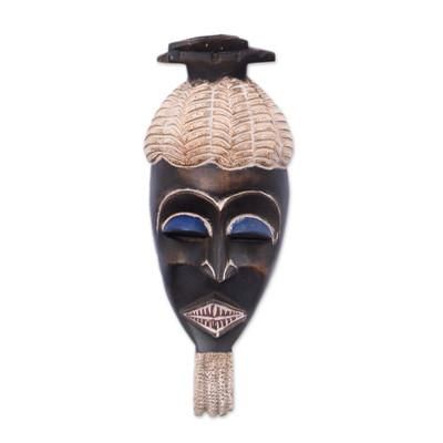 'Hand-Carved African Wood Wall Mask with Ceramic Accents'