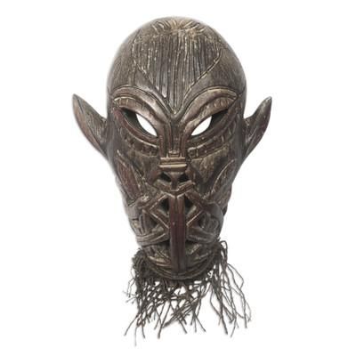 'Action Comics-Themed Sese Wood Mask Carved in Ghana'