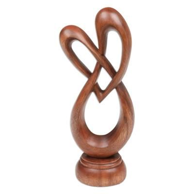 'Heart-Shaped Suar Wood Sculpture in a Natural Brown Hue'