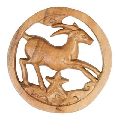 'Capricorn-Themed Hand-Carved Round Suar Wood Relief Panel'