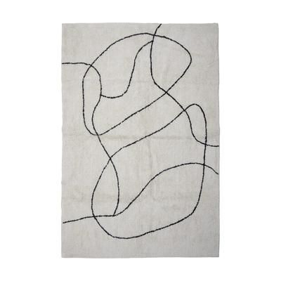 Tappeto in cotone bianco con motivo nero