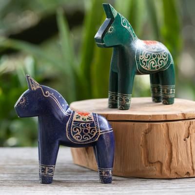 'Pair of Hand-Painted Batik Dala Horse-Themed Wood Figurines'
