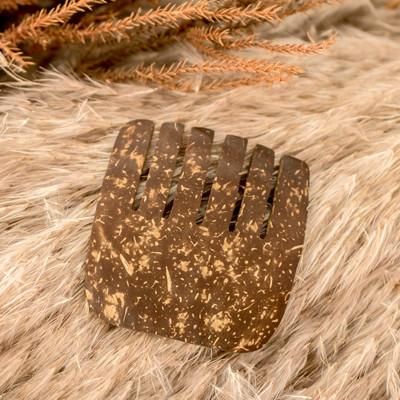'Eco-Friendly Coconut Shell Comb Handcrafted in El Salvador'