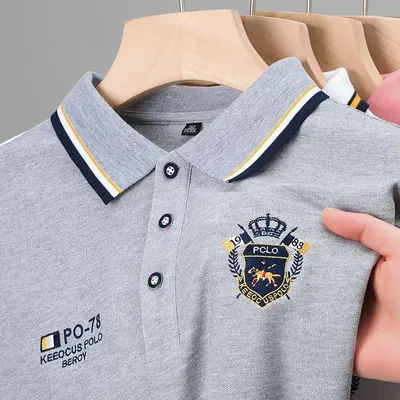 Polo à manches courtes brodé pour hommes, haut décontracté, document solide, nouvelle mode