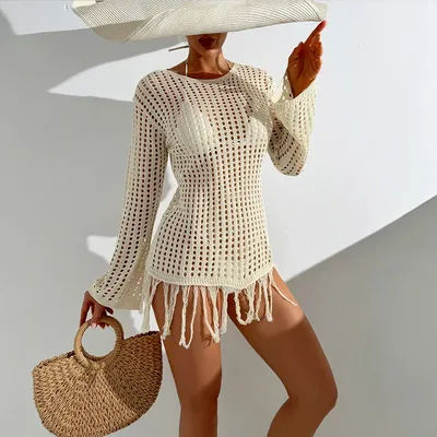 Nouveau Style tricot à manches longues vêtements de plage couvrir avec gland femmes plage vacances crème solaire Smock décontracté évider couvertures