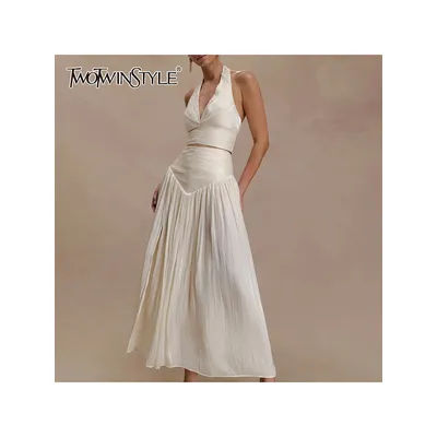 TWOTWINSTYLE solide minceur épissé froncé deux pièces ensembles pour les femmes licou sans manches haut court taille haute jupe ensemble femme
