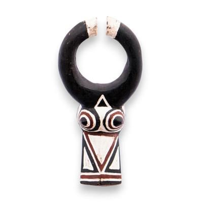 'Hand-Carved Painted African Wood Wall Mask with Horn Motif'