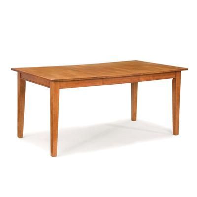 Dining Table by Homestyles in Oak