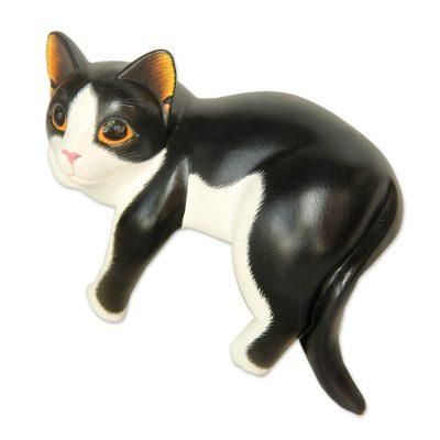 Wood sculpture, 'Tuxedo Cat Relaxes'