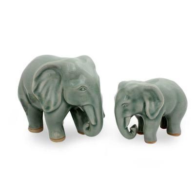 Celadon ceramic statuettes, 'Lovely Family in Light Green' (pair)