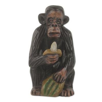 Ebony wood figurine, 'Banana Snack'