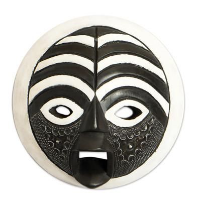 African wood mask, 'Rescued'