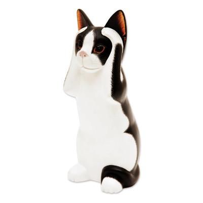 Wood sculpture, 'Hear No Evil Spotted Cat' - Albesia Wood Sculpture