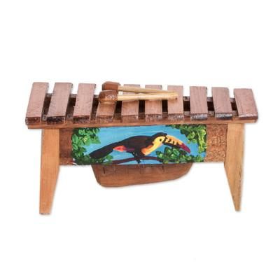 'Handcrafted Toucan-Inspired Pinewood Figurine of a Marimba'