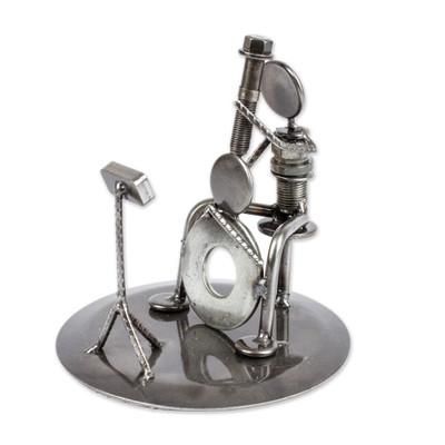 Auto part sculpture, 'Rustic Cellist'