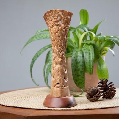 'Hand-Carved Nature-Themed Octopus Sculpture with Wood Base'