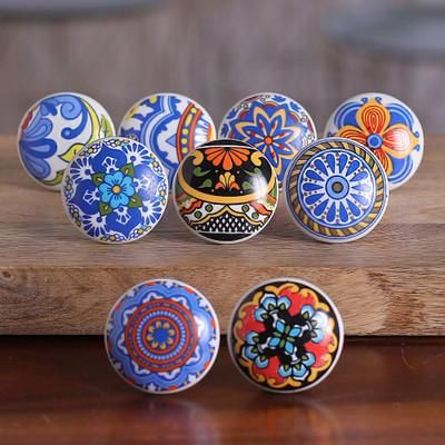 '9 Ceramic Knobs with Hand-Painted Floral and Leaf Motifs'