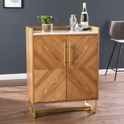 Trilken Bar Cabinet W Wine Storage by SEI Furniture in Brown