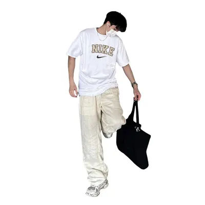 Nike Exercise T-shirts Men and Women Versatile Breathable Popular Fashionable Casual Short Sleeved Shirts Black/White