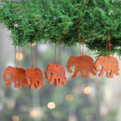 '5 Hand-Carved Wood Christmas Ornaments with Elephant Motif'