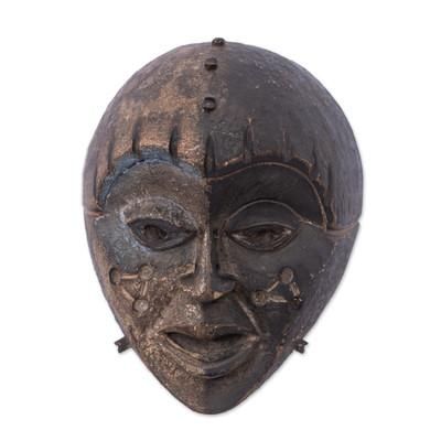 Ngando Shadow,'African Wood Wall Mask with Triangular Carvings on Cheeks'