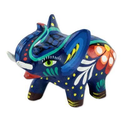 Unstoppable Force,'Small Wood Hand Painted Elephant Figurine'