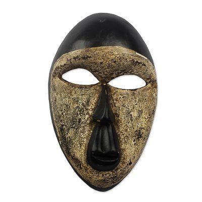 Nusetor,'Painted African Sese Wood Mask'