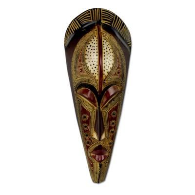 African mask, 'Silence is Golden'