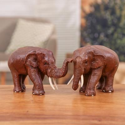 Forever Love,'2 Wood Sculptures of Elephants with their Trunks Up and Down'
