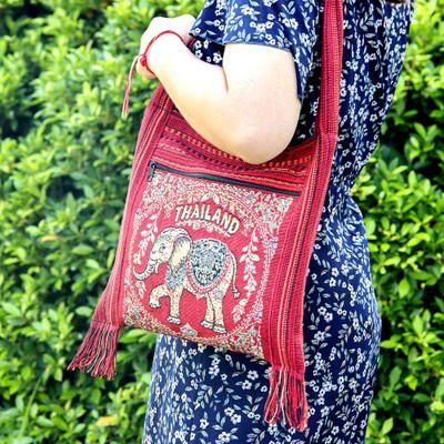 'Elephant-Themed Red Fringed Sling Bag with Handwoven Accents'