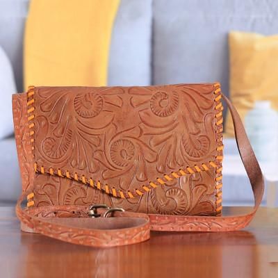 Swirling Vines,'Embossed Brown Leather Sling Bag with Stitched Accents'