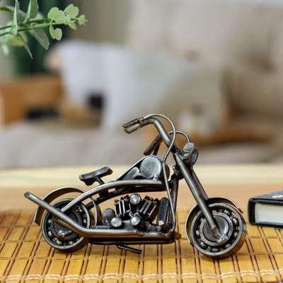 'Motorcycle-Themed Eco-Friendly Recycled Metal Sculpture'