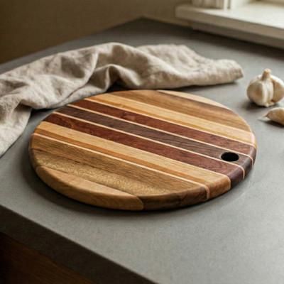 'Hand-Carved Wood Cutting and Charcuterie Board with Stripes'