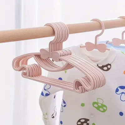 10-100PCS Kids Plastic Hangers Portable Windproof Clothes Rack Cute Bow Design Space Saving Child Baby Clothes Drying Organizer