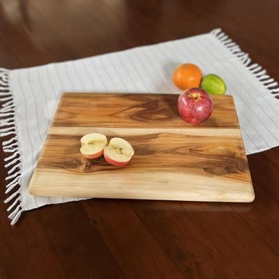 'Eco-Friendly Hand-Carved Teak Wood Cutting Board in Brown'