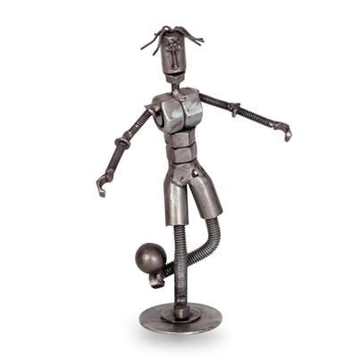 'Eco-Friendly Recycled Metal Sculpture of a Soccer Player'