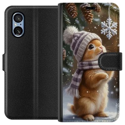 Kompatibelt Lommeboketui til Sony Xperia 10 VI Vinterkanin med lue og skjerf beundrer sjarmerende snøfnugg vinterscene fylt med julestemning