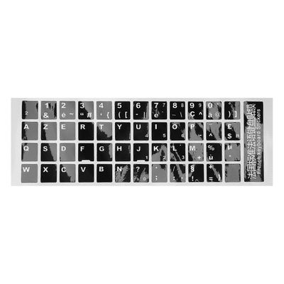 Valkoiset kirjaimet ranskalainen Azerty-näppäimistötarrakansi musta kannettavalle tietokoneelle