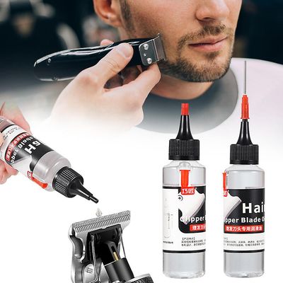 Voiteluaine hiustrimmeri-teräöljy Ammattimaiset parturit Parranajokone Voiteluaineleikkuri liukuvoide partureille 1pc