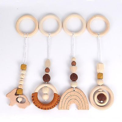 4 stk / sæt Baby Begyndervanskeligheder Sygepleje Rattle Toys Gaver Play Gym Frame Klapvogn hængende vedhæng Træ Ring Teether Kindter Brown