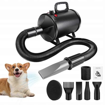 Kuivausrumpuun, jossa on koirankarvojen puhallin ja pysäyttämätön