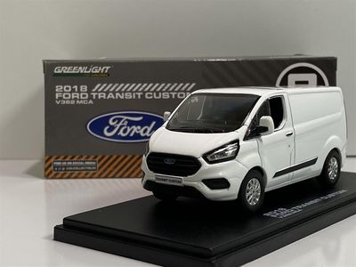 Green Light 2018 Ford Transit tilpasset V362 MCA frossen hvit 1:43 skala Greenlight 51275