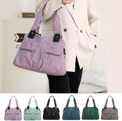 Vanntett, stor kapasitet Multi Pocket Nylon Shoulder Bag, Utility Tote Bag med lommer og rom for kvinner Svart