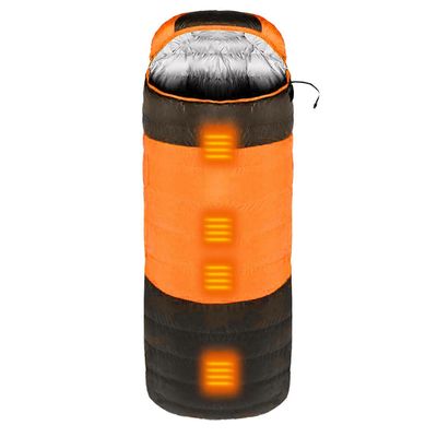 Lämmitetty makuupussi säilytyssäkillä ulkona talvi lämmin makuupussi retkeilyyn, patikointiin ja matkustamiseen Oranssi