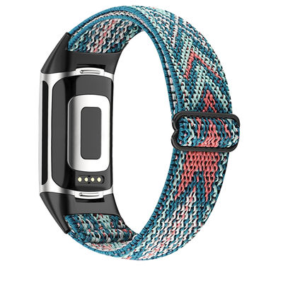 Fitbit Charge 5 klokkerem med flettemønster Blå/oransje